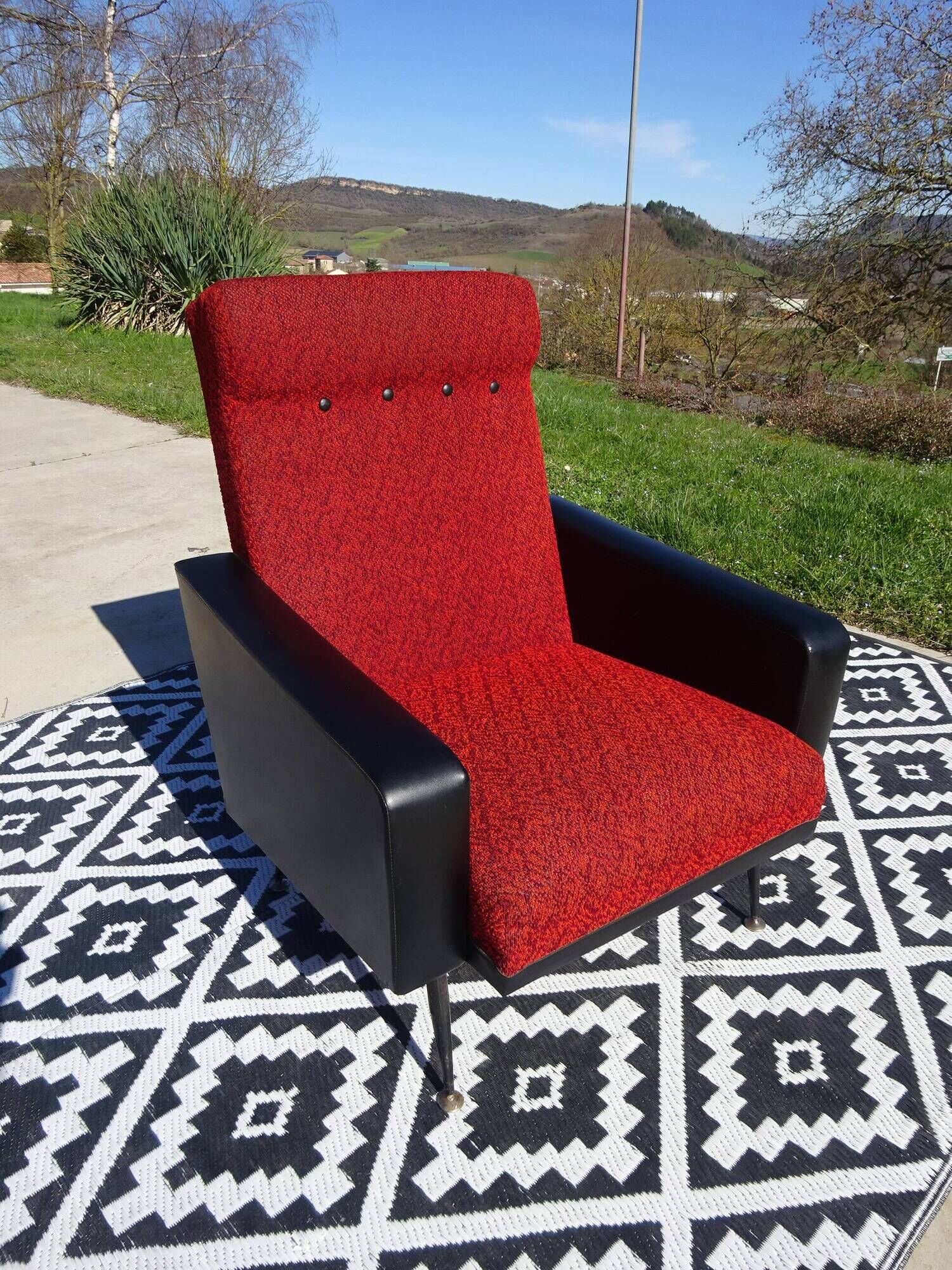 Vintage pair of red and black armchairs