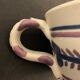 Pair of ceramic cups including a mustache cup for gentleman