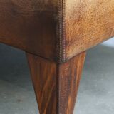 Hocker/coffee table made of sheepskin