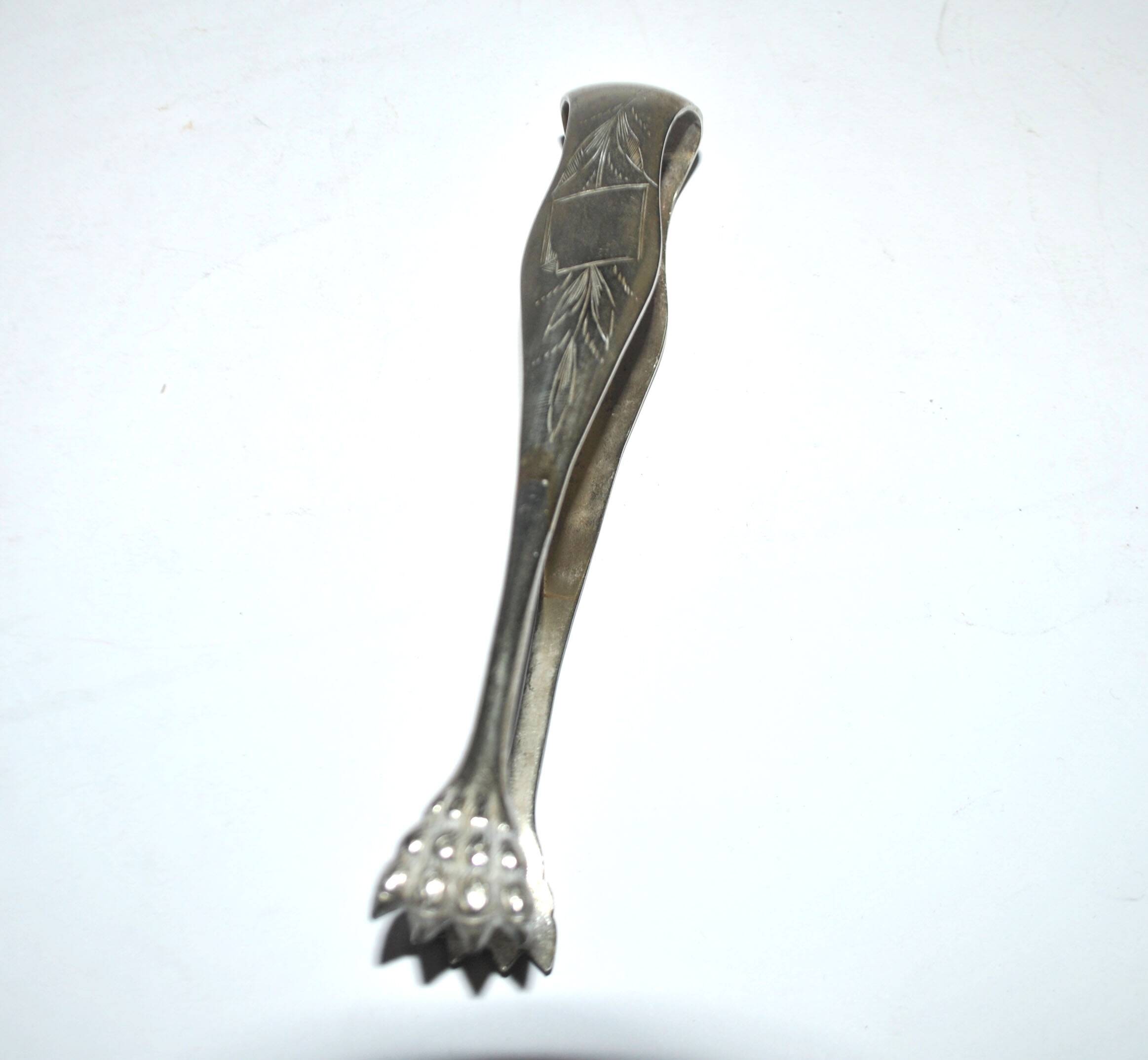 Vintage engraved silver metal lion claw sugar tongs