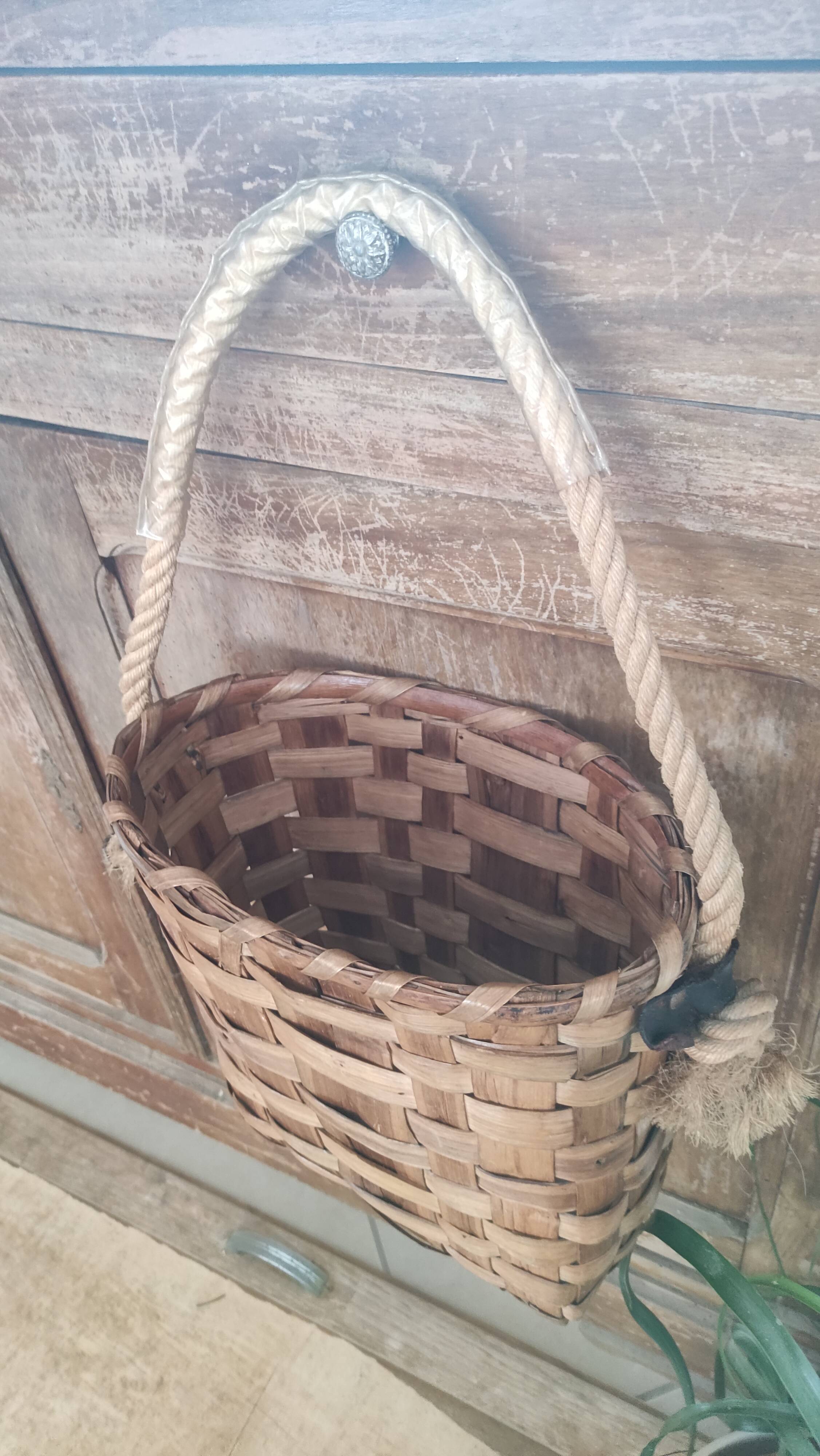 Basket or bag to put or hang leather, rope, brass and rattan