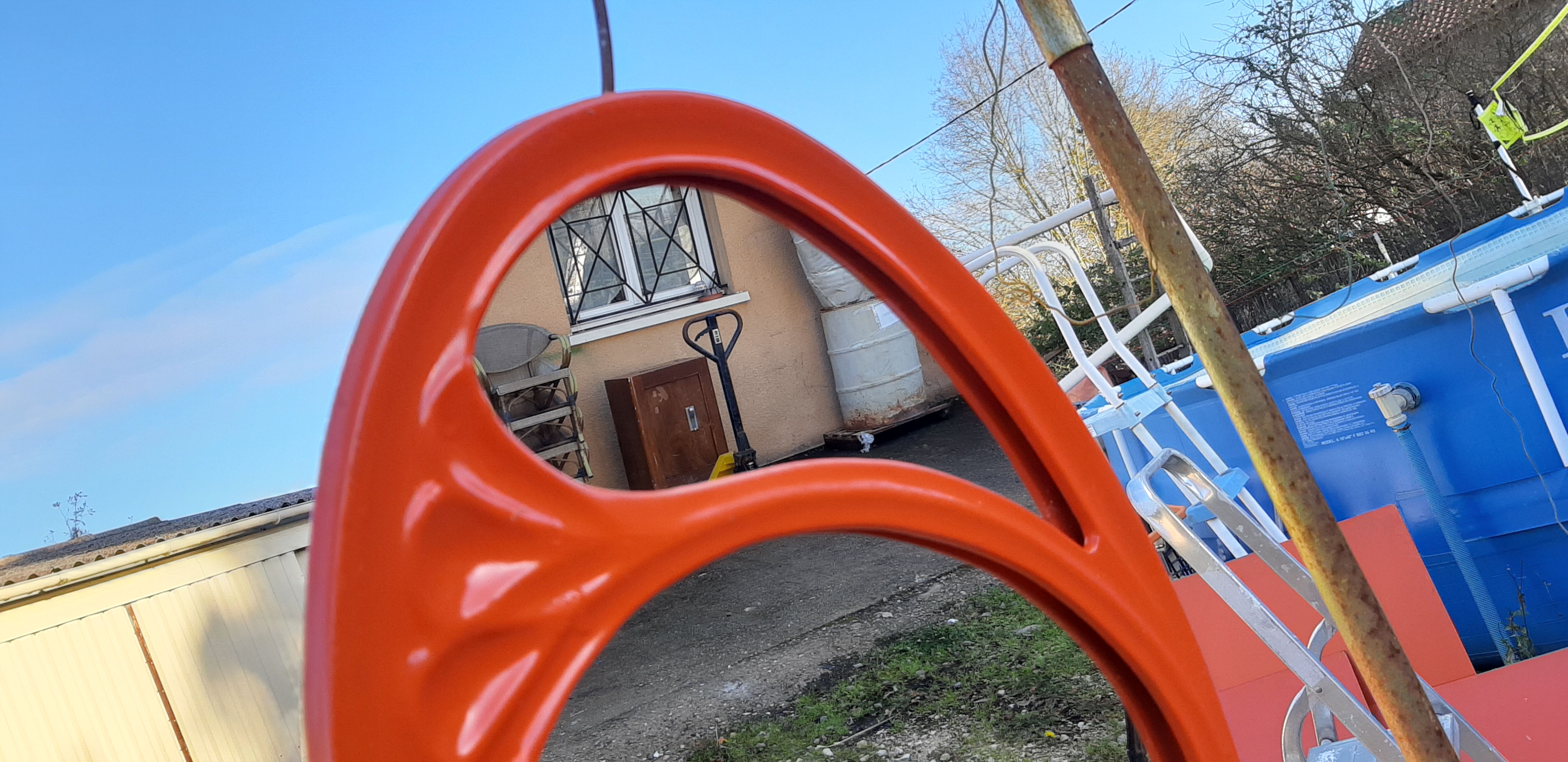 Vintage mirror enamelled cast iron orange