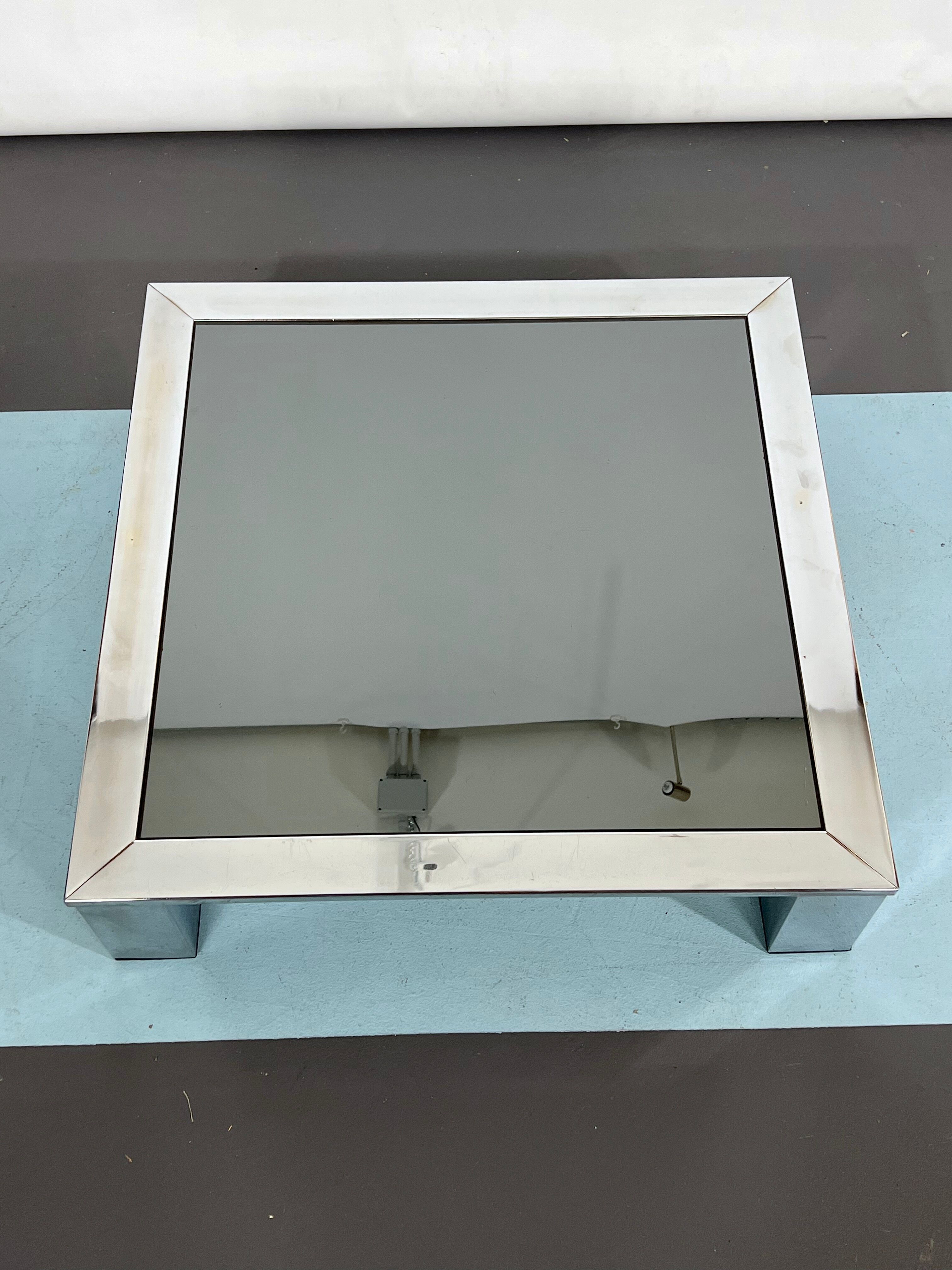 Mid-century chrome and dark mirror glass side table attributed to Saporiti. Italy 1970s