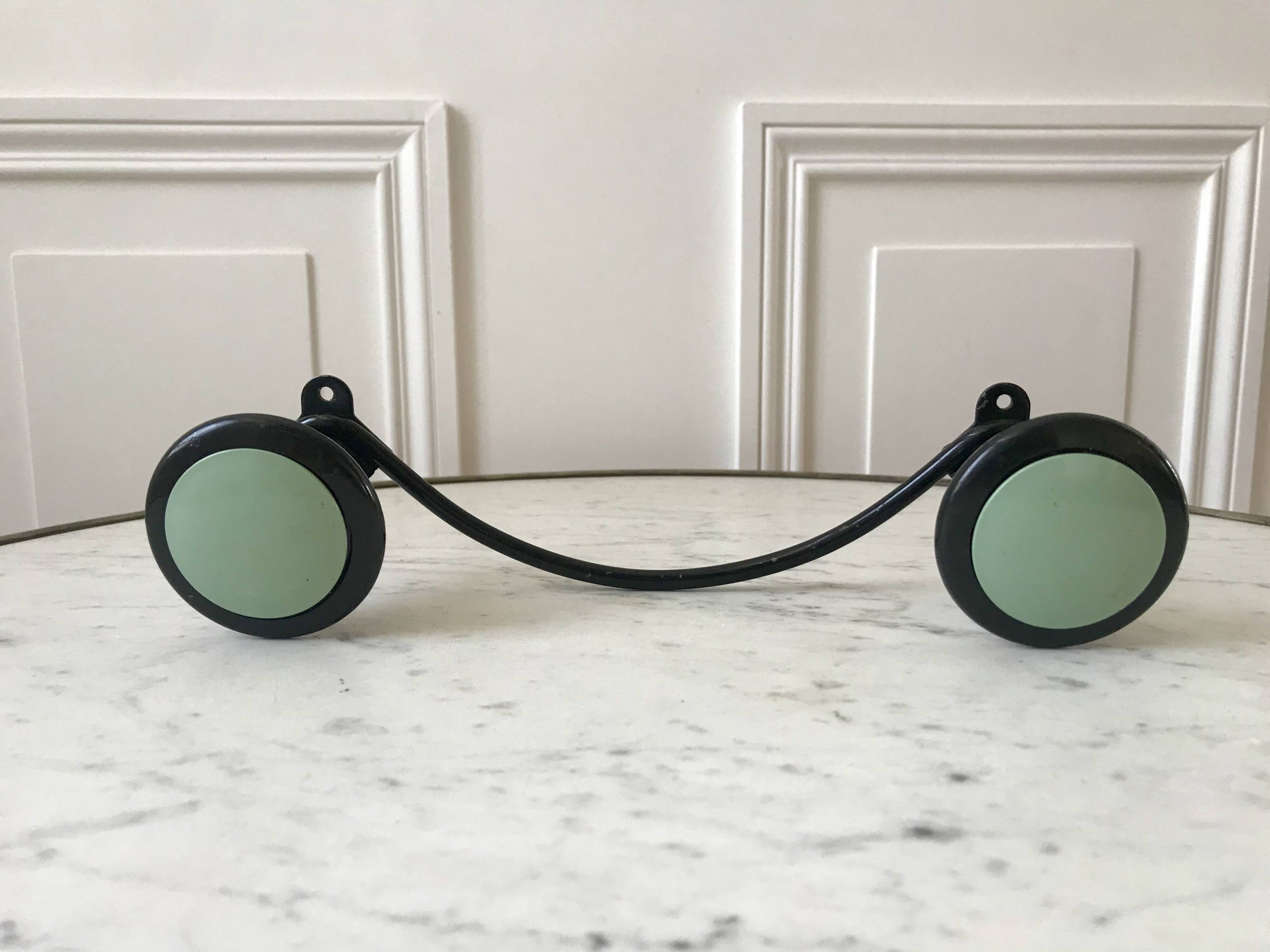 Design coat hook in sage green and black metal from the 70s