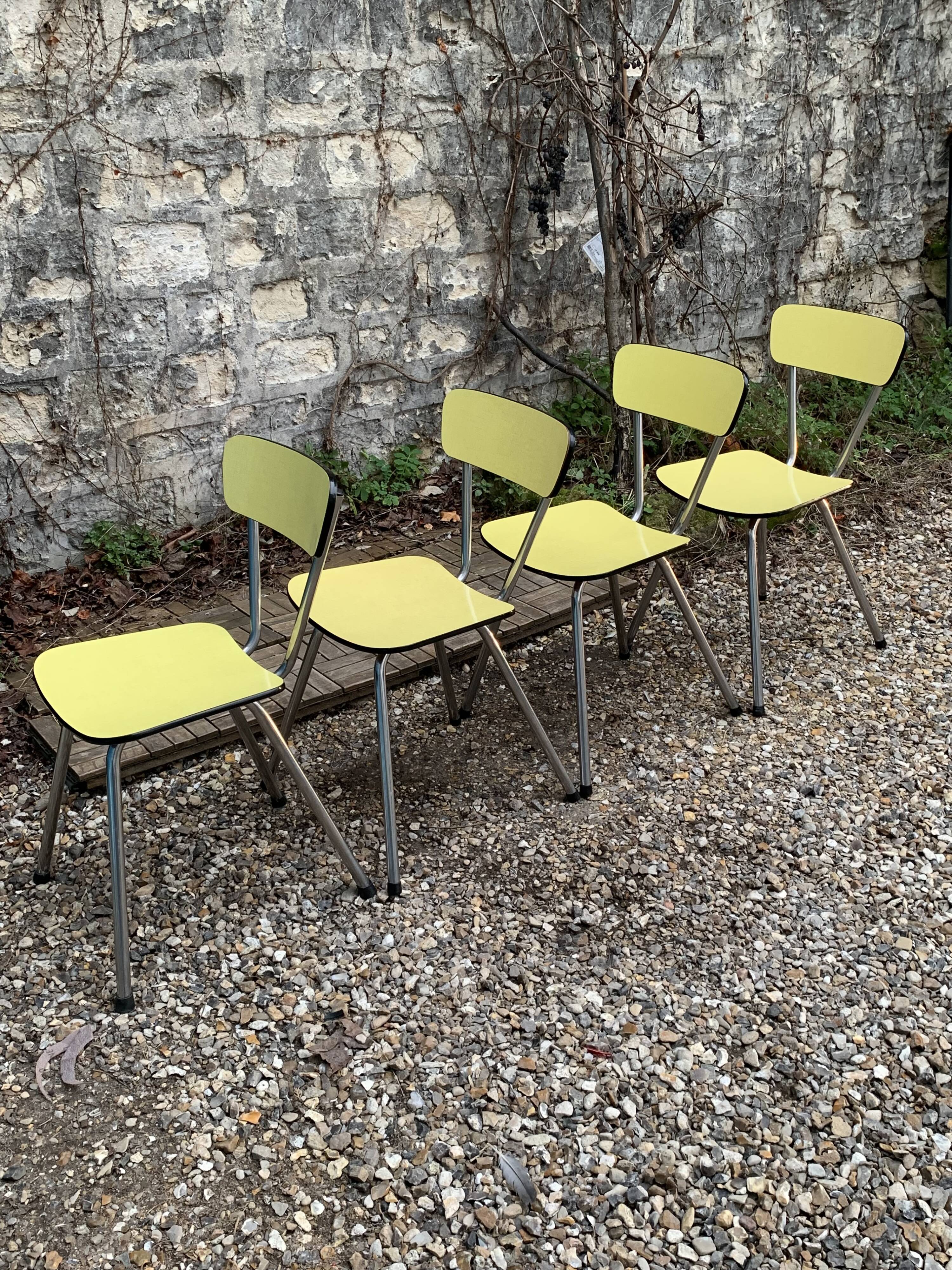 Yellow Formica chairs with compass legs, 1950s