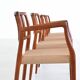Niels Otto Moller model 66 armchairs teak and paper cord Denmark 1974