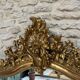Antique mirror 183.5/116cm with pediments and pearl detailing in gold leaf.