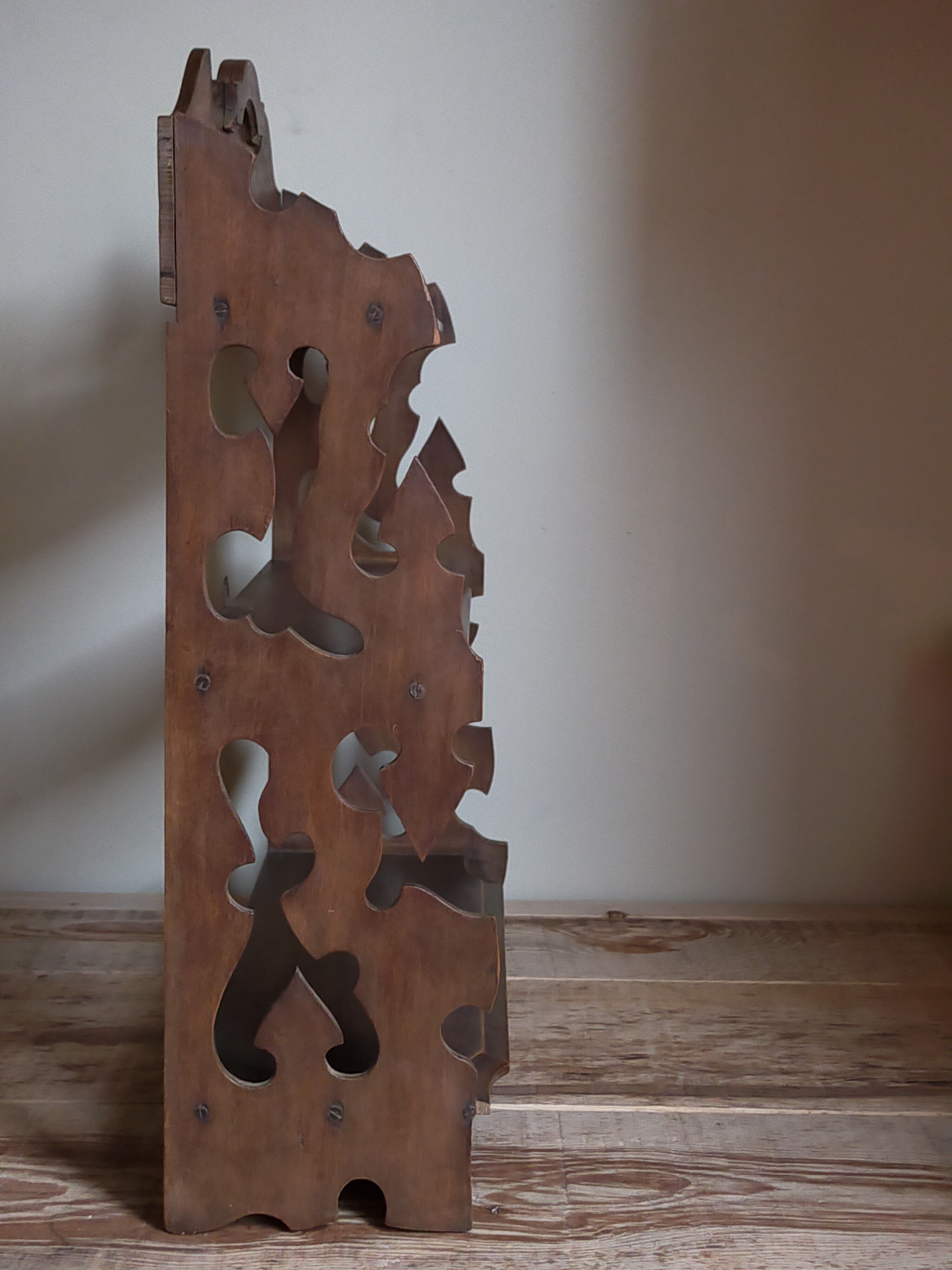 Old carved wooden wall shelf