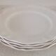 Set of 4 Sarreguemines ivory plates