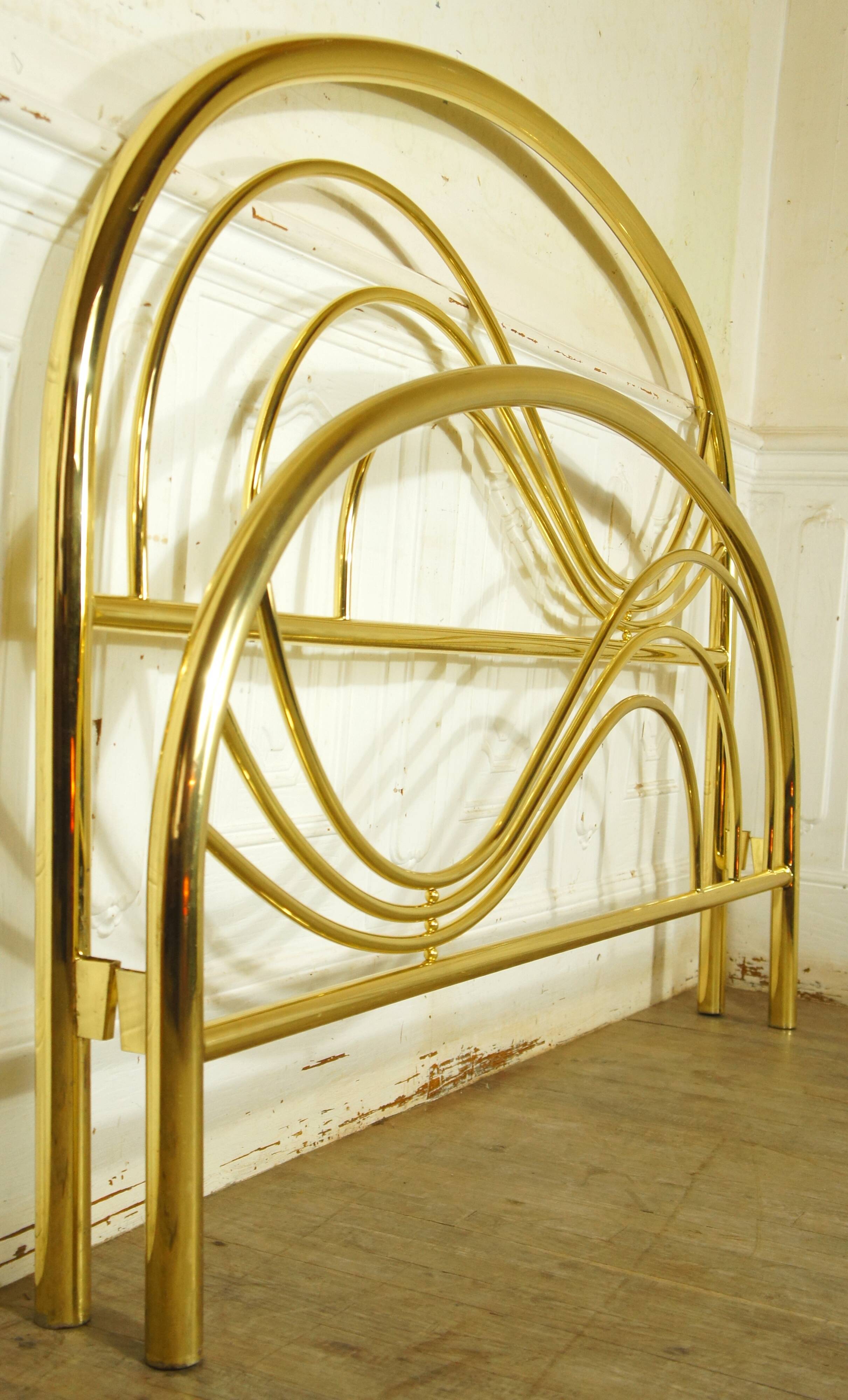 Hollywood Regency bed in gilded metal, circa 1970