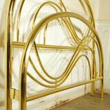 Hollywood Regency bed in gilded metal, circa 1970