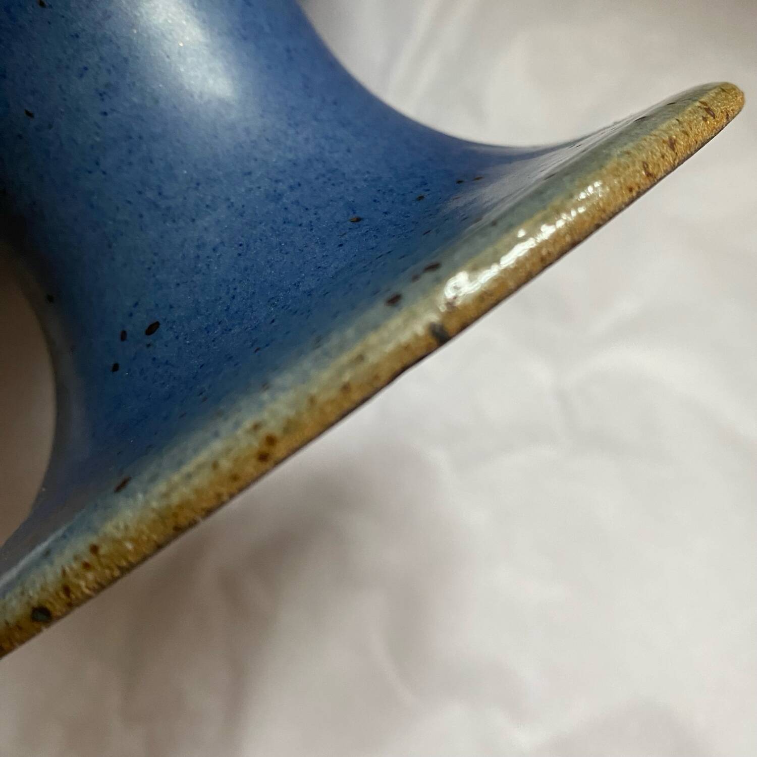 Signed blue stoneware fruit bowl