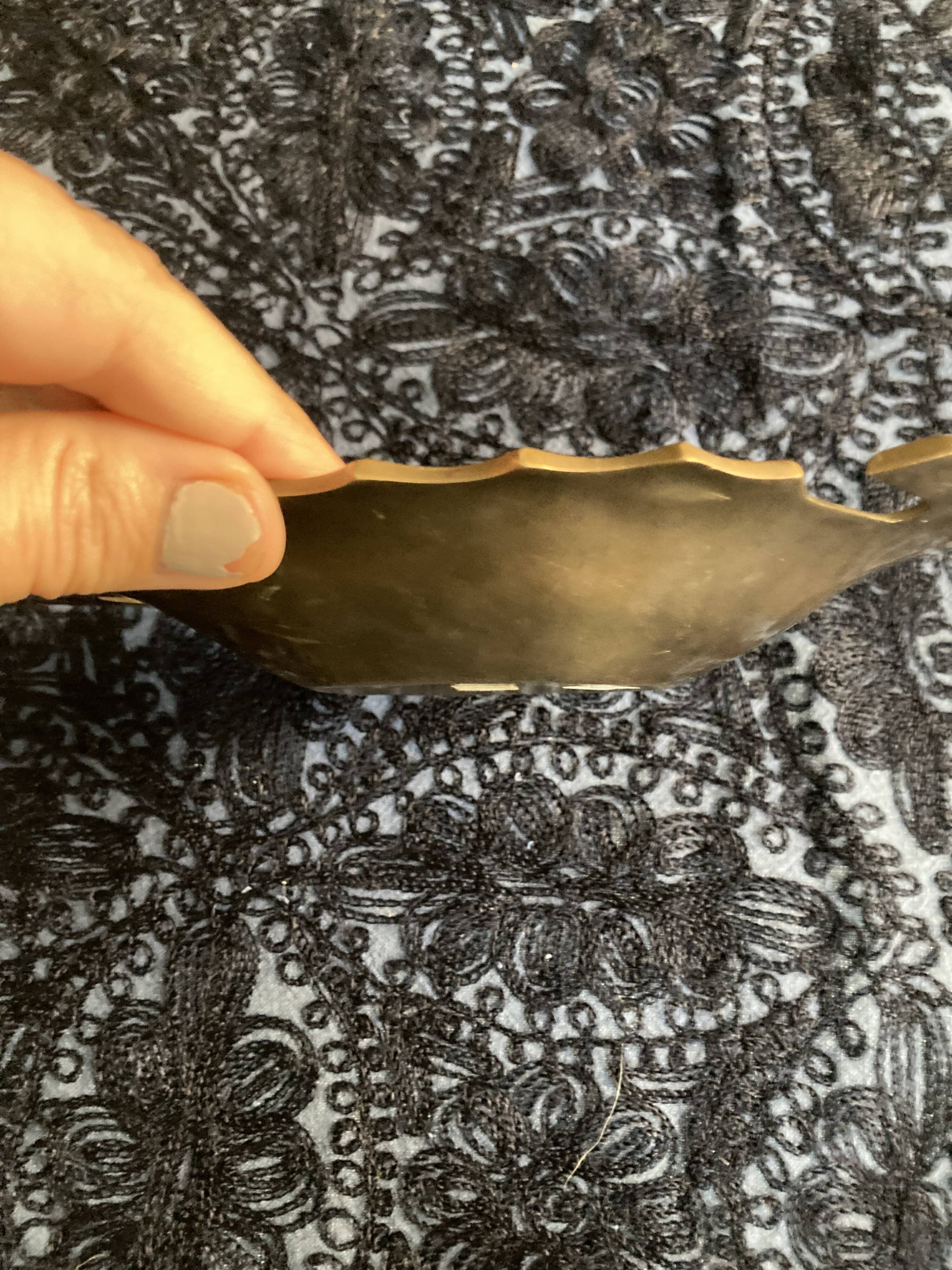 Bronze pineapple pocket emptier