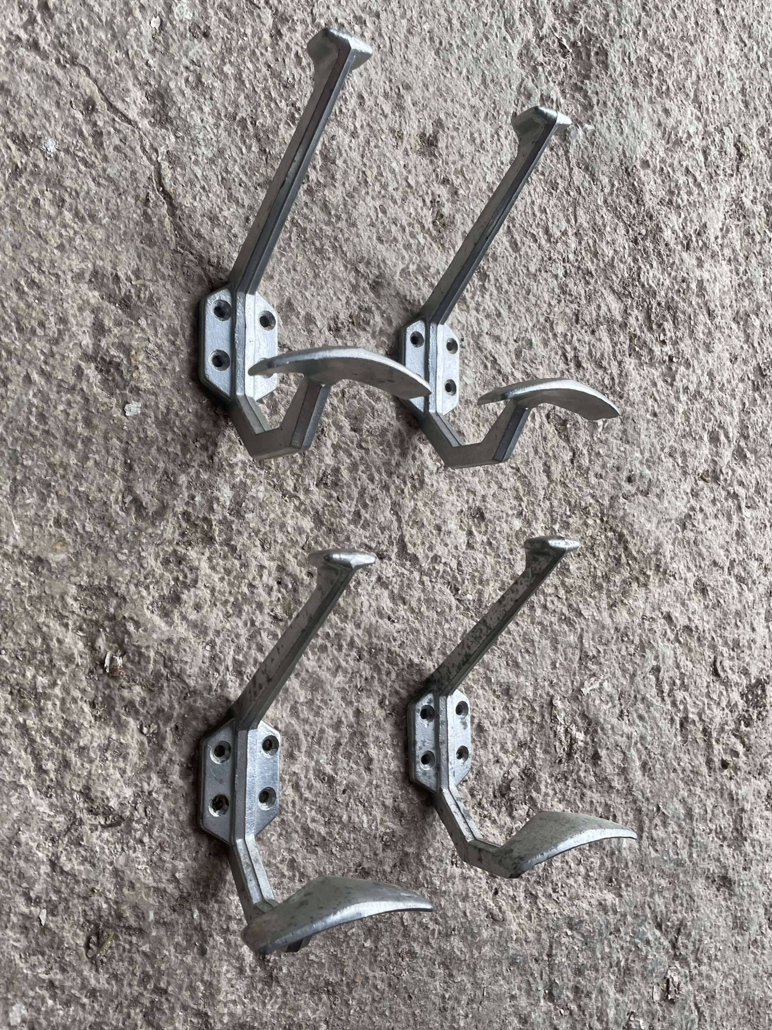 Set of 4 old metal coat hooks