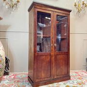 Bibliothèque vitrine formant cartonnier en acajou d’époque restauratio