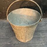 Ancient metal garden bucket