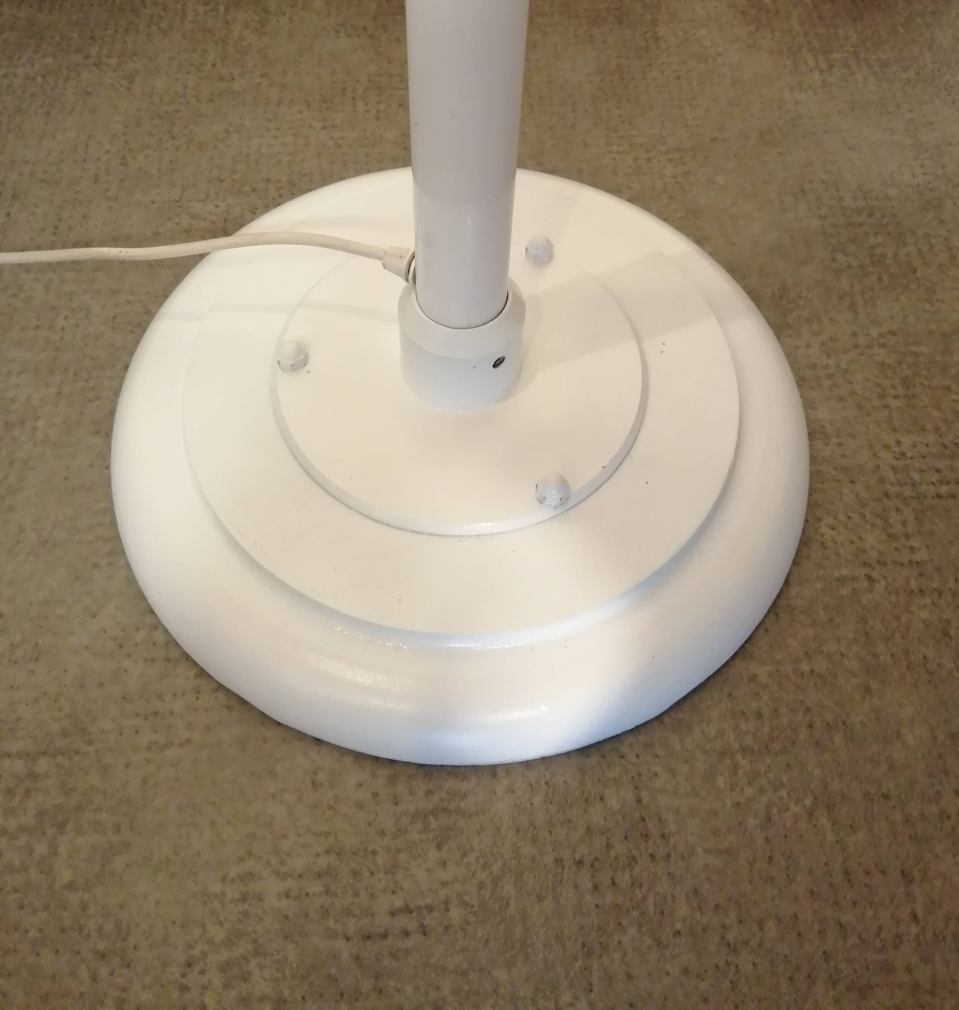 Adjustable metal floor lamp with its vintage smoked ball model from Roger Pradier 1970