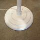 Adjustable metal floor lamp with its vintage smoked ball model from Roger Pradier 1970