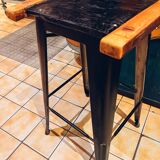 Antique bar stool with wooden seat