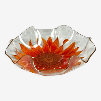 Glass cup with orange sunflower