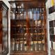 Pair of Empire period mahogany bookcases with flame pattern from the 19th century.