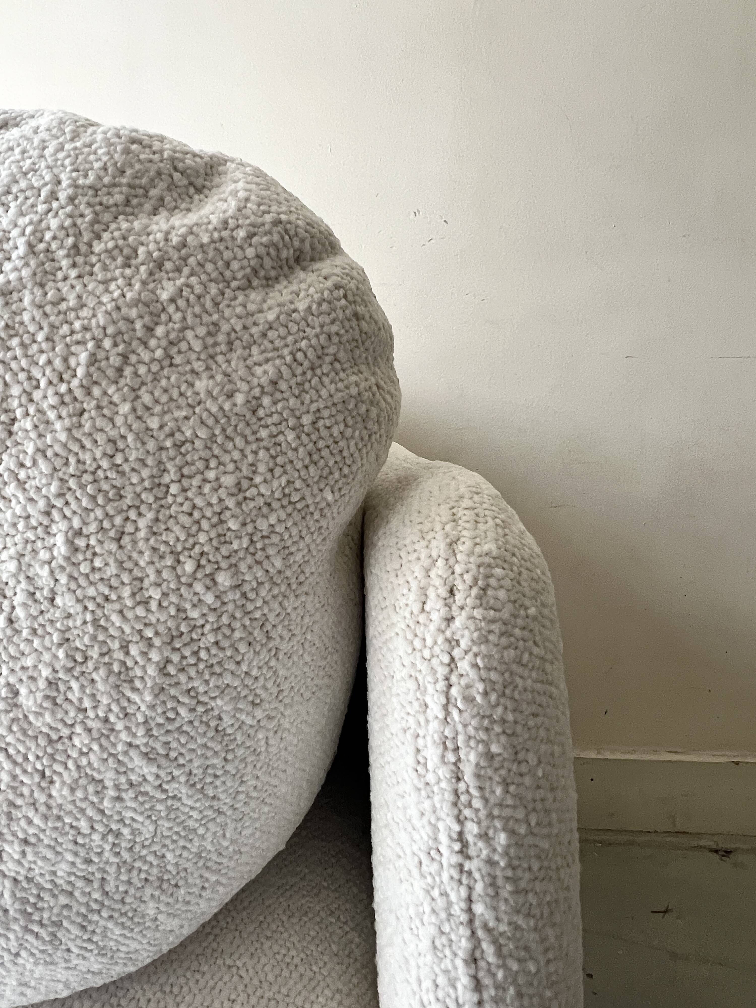 Italian off-white chenille armchair with a wooden base, 1970s design.