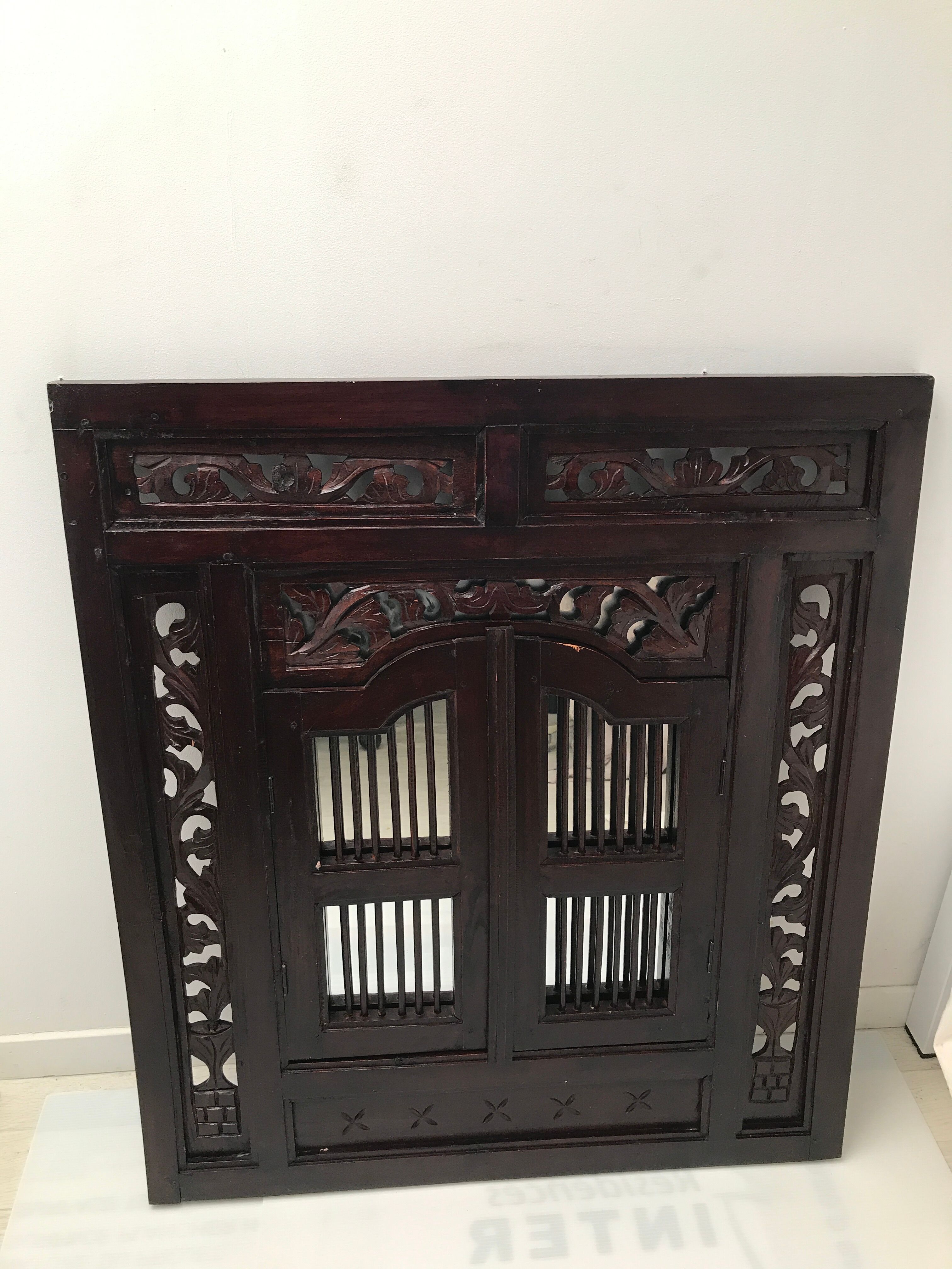 Vintage shuttered Indonesian mirror