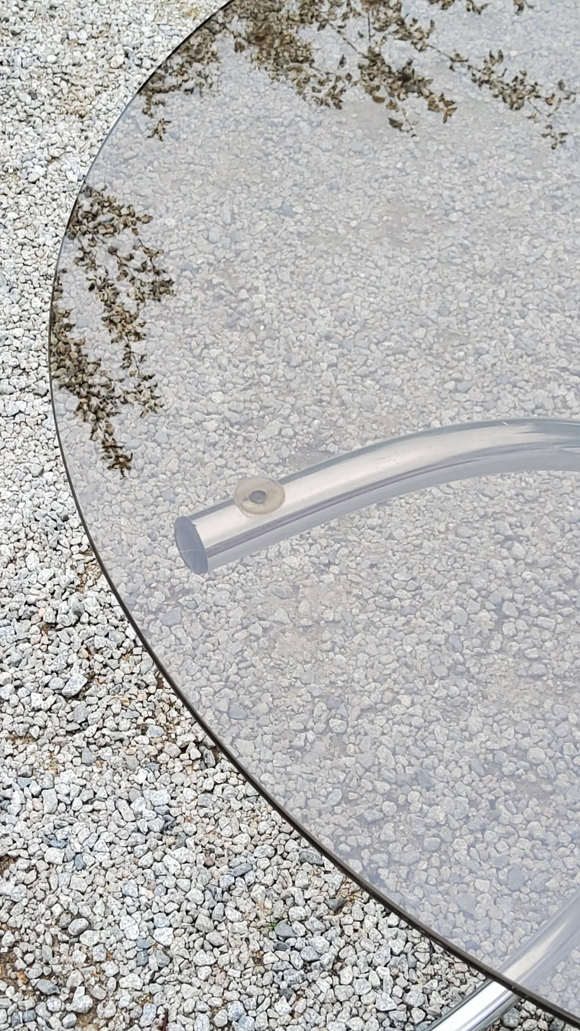 Dining table from the 70s top smoked glass base chrome