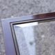 Nesting tables in burgundy lacquered metal and brass, France 1950s