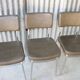 3 bronze-green faux leather chairs with chrome frames