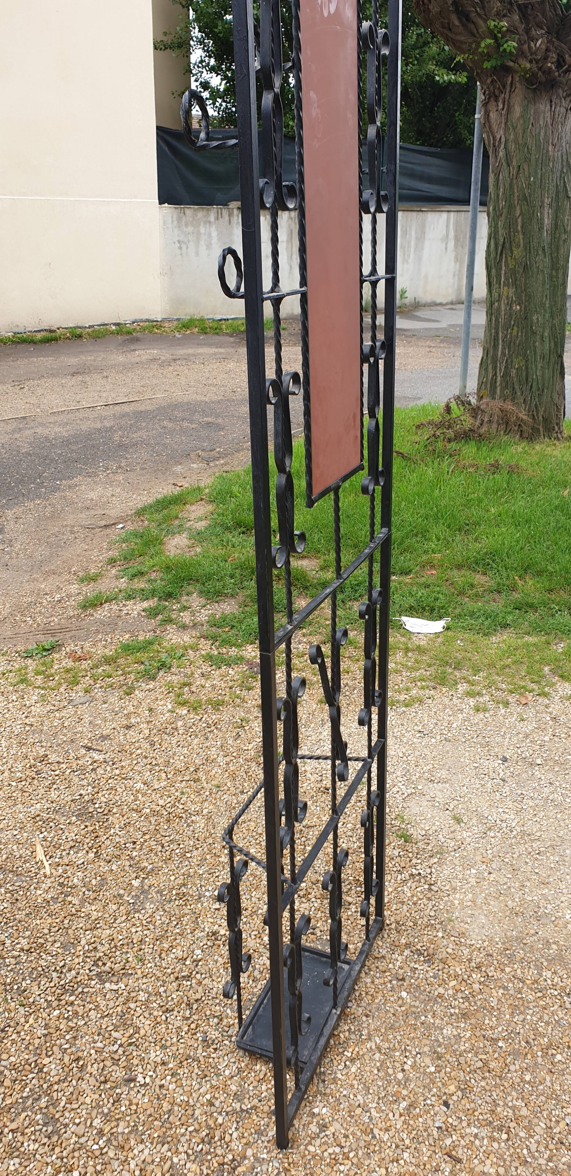 Wrought iron coat holder