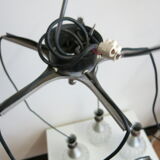 Mid-century cascading suspension