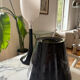 Miss K table lamp edited by Flos, designed by Philippe Starck in