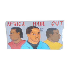 Panneau peint de coiffeur.