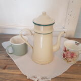 Old pale yellow enamelled coffee maker with filters