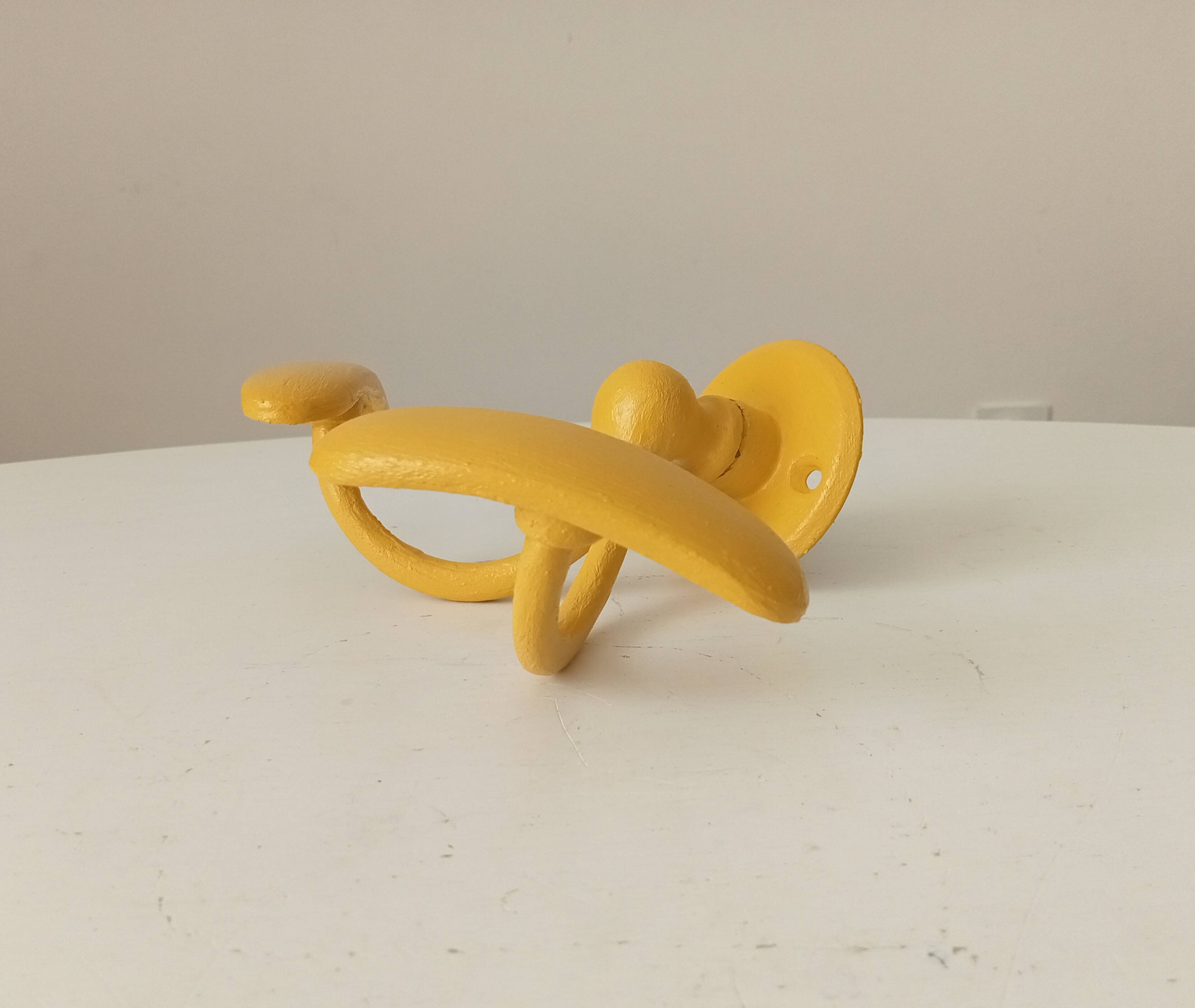 Vintage double coat rack in solid brass