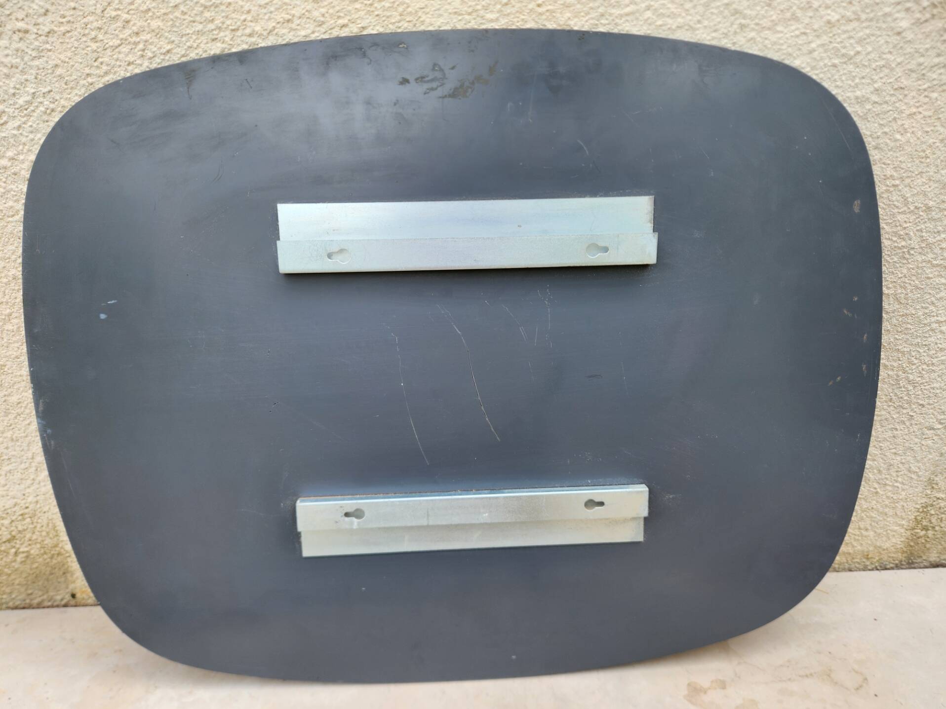 Vintage smoked bronze wall mirror, free form, 1970s – 70 x 55 cm