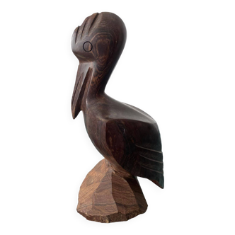 Carved wooden pelican. Dark wood.