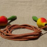 Old wooden jump rope toy painted in the shape of pear fruit ref