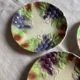Set of eight flat dessert plates in barbotine earthenware with grape decoration – circa 1900.