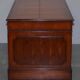 Partner desk with double pedestal in burr yew wood with decorated top.