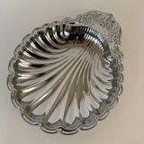 Large silver-plated serving dish in the shape of a vintage shell.