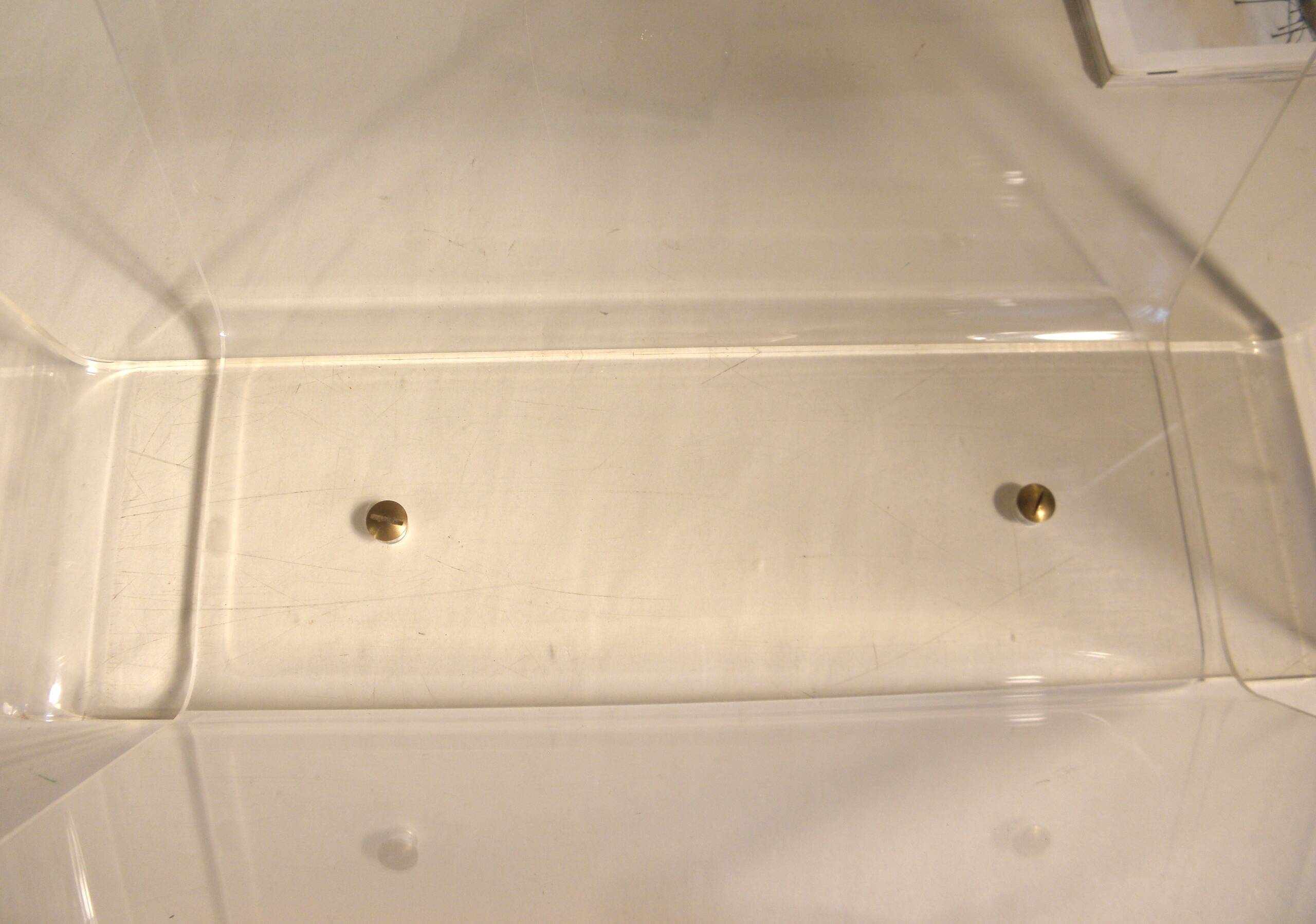 Plexiglass and metal dore magazine holders