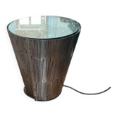 Illuminated side table in brushed metal and faceted mirror.
