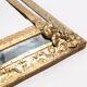 Medium vintage mirror with a decorative gold and blue metal frame, Italy, 1960s.