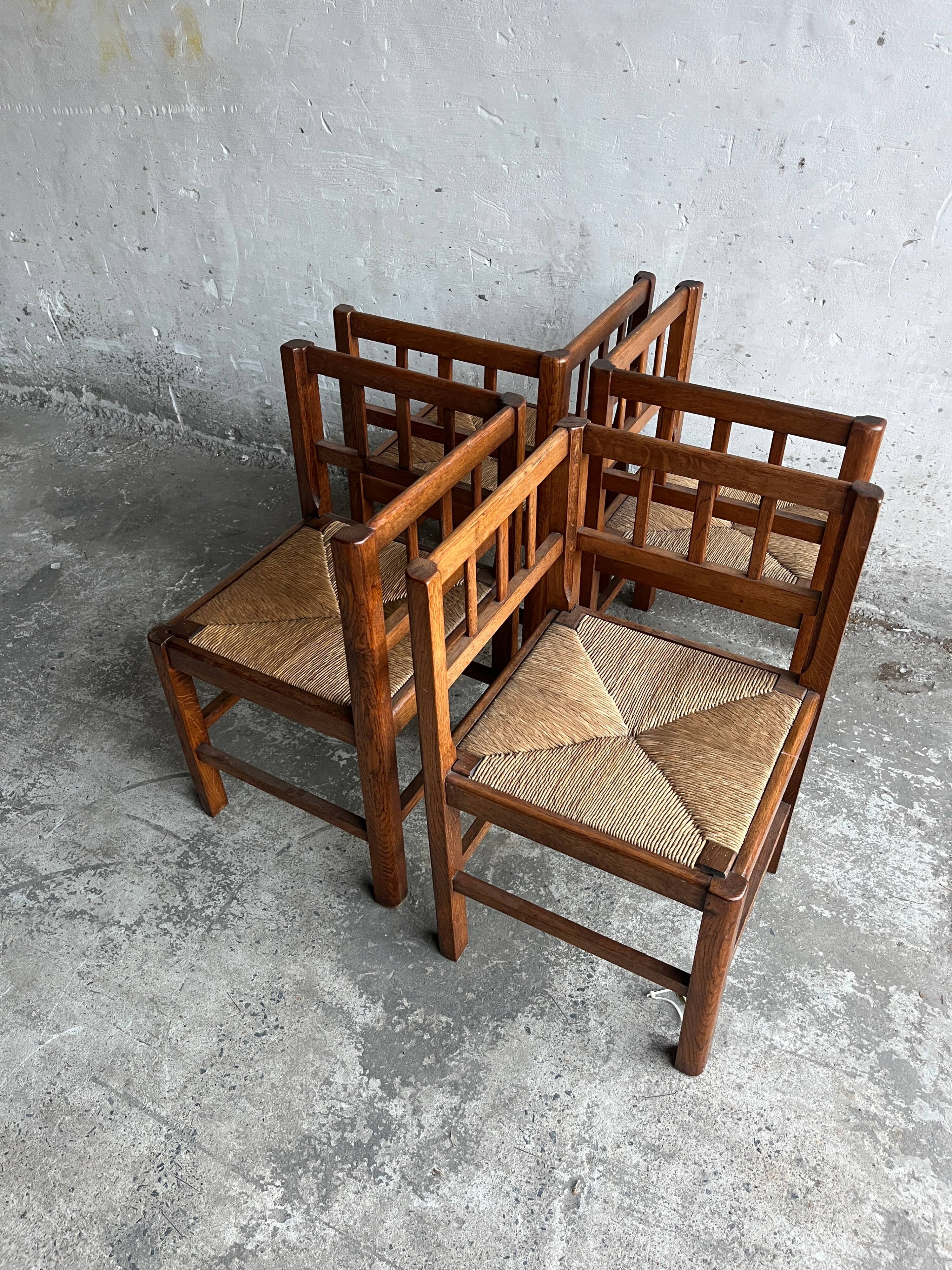 Set of 4 brutalist oak armchairs, 1950s