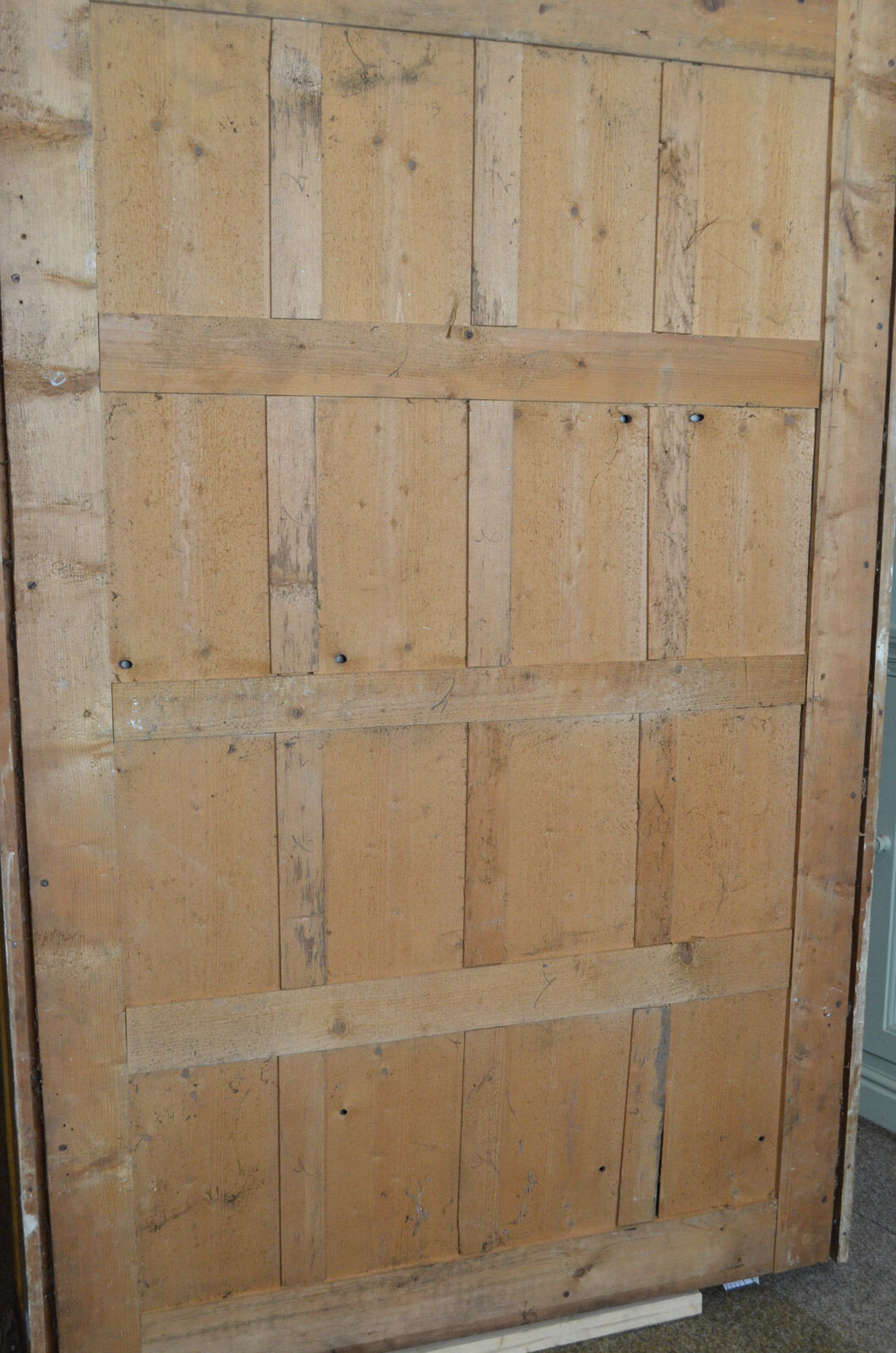 Nineteenth century monumental mirror in gilded wood