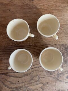 Lot of 4 coffee cups in sandstone