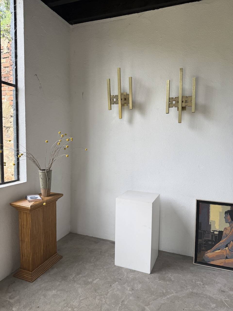 Pair of Regency brass wall lights in Italy