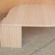 Table basse vintage en travertin par les éditions Roche Bobois